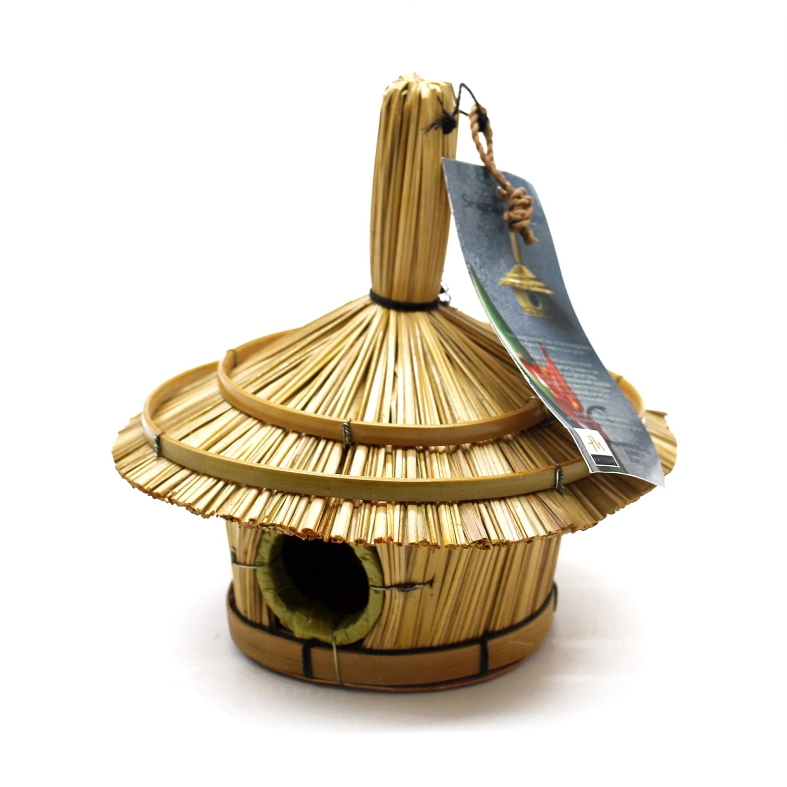 Small Round Seagrass Bird Box 17x17cm hanging from a tree branch in a garden setting, showcasing natural woven seagrass texture and round entrance hole.