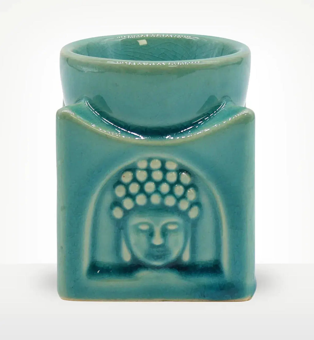 Square Buddha Burner - Soft Turquoise ceramic oil burner featuring a serene Buddha face embossed on a square base, perfect for Buddha decor and incense burning.
