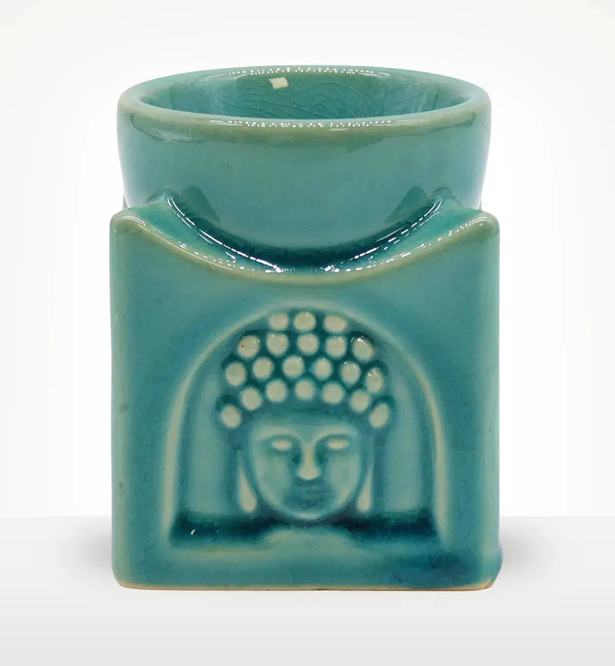 Square Buddha Burner - Soft Turquoise ceramic oil burner featuring a serene Buddha face embossed on a square base, perfect for Buddha decor and incense burning.