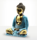 Teal & Gold Buddha - Medium statue featuring a serene meditative pose with intricate gold detailing and a vibrant teal robe, crafted as a resin Buddha decor piece.