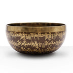 Tibetan Healing Engraved Bowl - 16cm - Mantra with intricate gold Tibetan script engraving on a dark bronze surface, designed for meditation and spiritual healing practices.