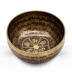 Tibetan Healing Engraved Bowl - 16cm - Mantra with intricate golden Tibetan script and symbolic designs inside and on the rim, crafted from polished metal for spiritual use.