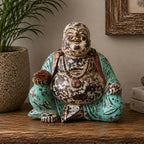 Vintage Mint Hand Carved Wooden Buddha Statue - 40cm - Happy Buddha sitting cross-legged with a distressed mint green robe and a joyful expression, displayed on a wooden surface.
