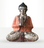 Vintage Mint Hand Carved Buddha Statue - 30cm - Teaching Transmission depicting a seated Buddha with folded hands in prayer, featuring distressed orange and cream paint on a detailed hand-carved design.