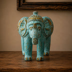 Wood Carved Elephant - Turquoise Gold featuring intricate hand-carved details with turquoise and gold accents, showcasing a beautifully textured decorative elephant figurine.