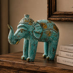 Wood Carved Elephant - Turquoise Gold featuring intricate hand-carved details with turquoise and gold accents, showcasing a beautifully textured decorative elephant figurine.