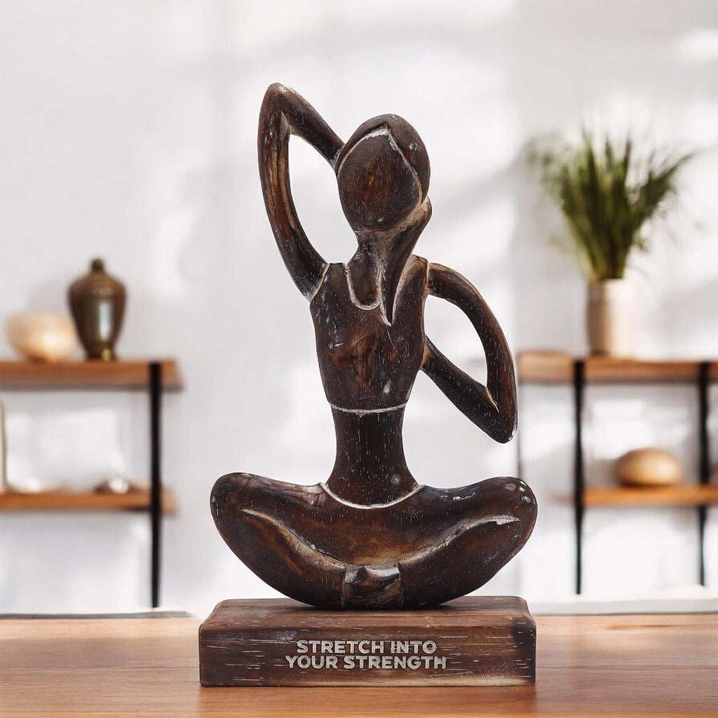 Wooden Yoga Lady - Antique - Cow Face Pose - "Stretch into Your Strength" depicts a hand-carved wooden figure in a seated yoga pose, symbolizing strength and mindfulness.