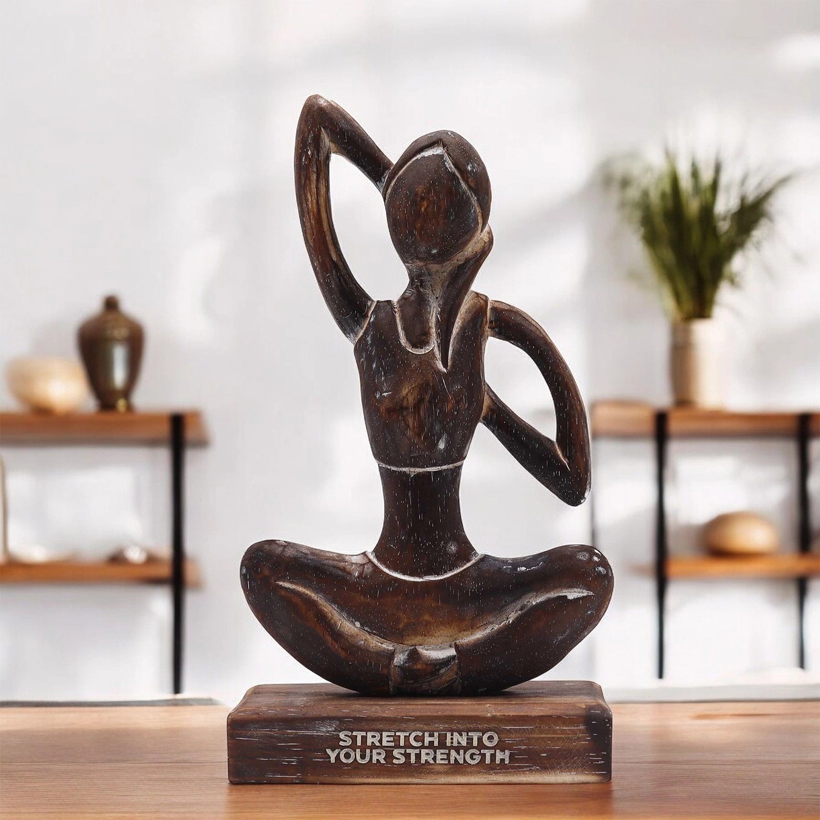 Wooden Yoga Lady - Antique - Cow Face Pose - "Stretch into Your Strength" depicts a hand-carved wooden figure in a seated yoga pose, symbolizing strength and mindfulness.