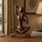 Wooden Yoga Lady - Antique - Cow Face Pose - "Stretch into Your Strength" depicts a hand-carved wooden figure in a seated yoga pose, symbolizing strength and mindfulness.
