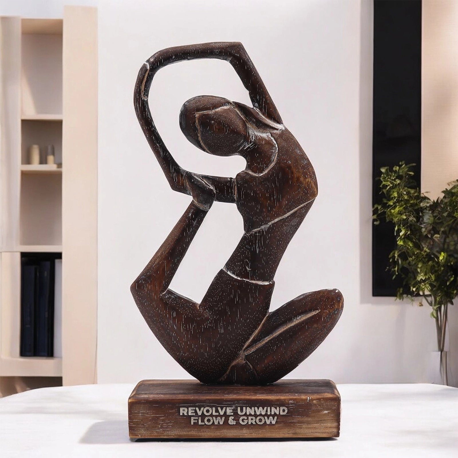 Wooden Yoga Lady - Antique - Revolved Pose - "Revolve Unwind - Flow & Grow" hand-carved wooden sculpture of a woman in a graceful, flowing yoga pose on a wooden base.