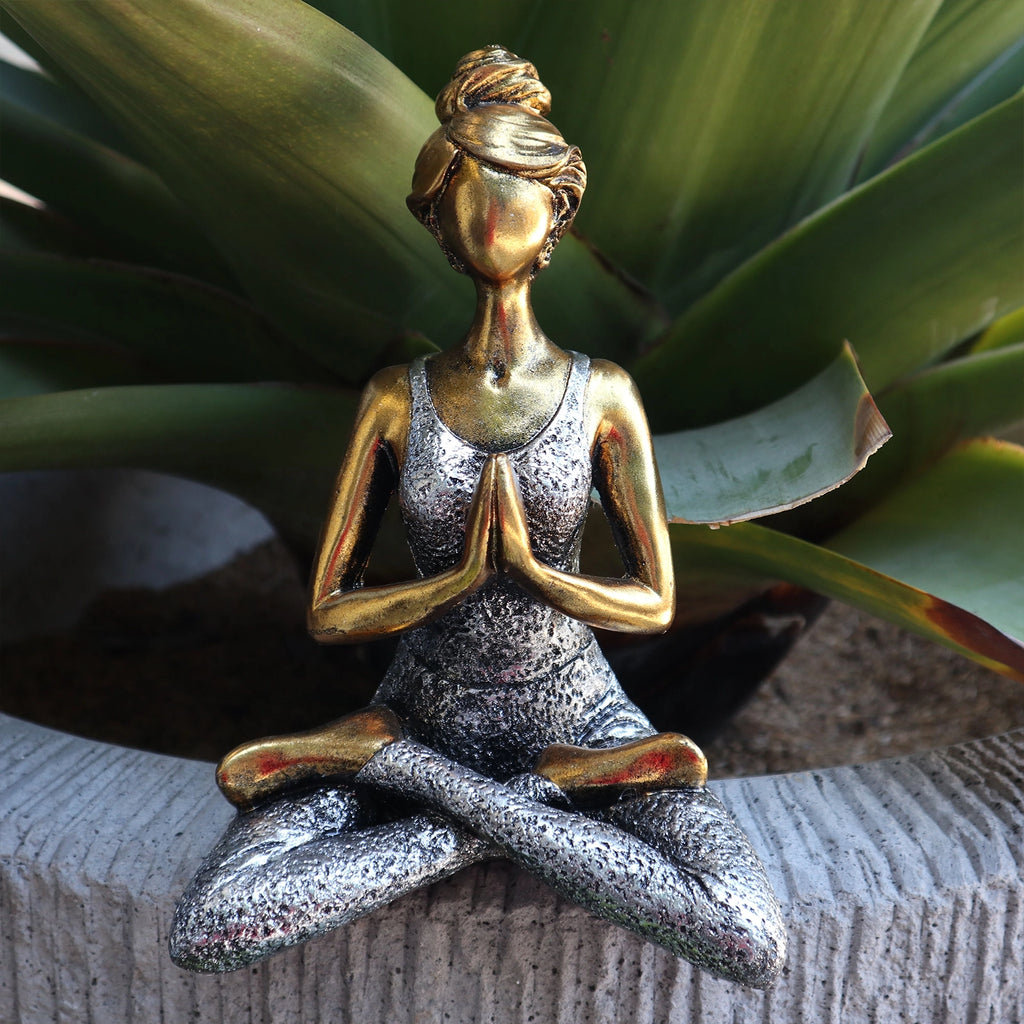 Yoga Lady Figure - Bronze & Silver 24cm depicts a serene woman in a seated meditation pose, blending bronze and silver tones for a calming decorative accent.