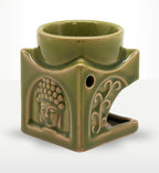 Square Buddha Burner - Light Jade in smooth ceramic with engraved Buddha face and decorative swirls, designed as an elegant Buddha oil burner for tranquil home decor.