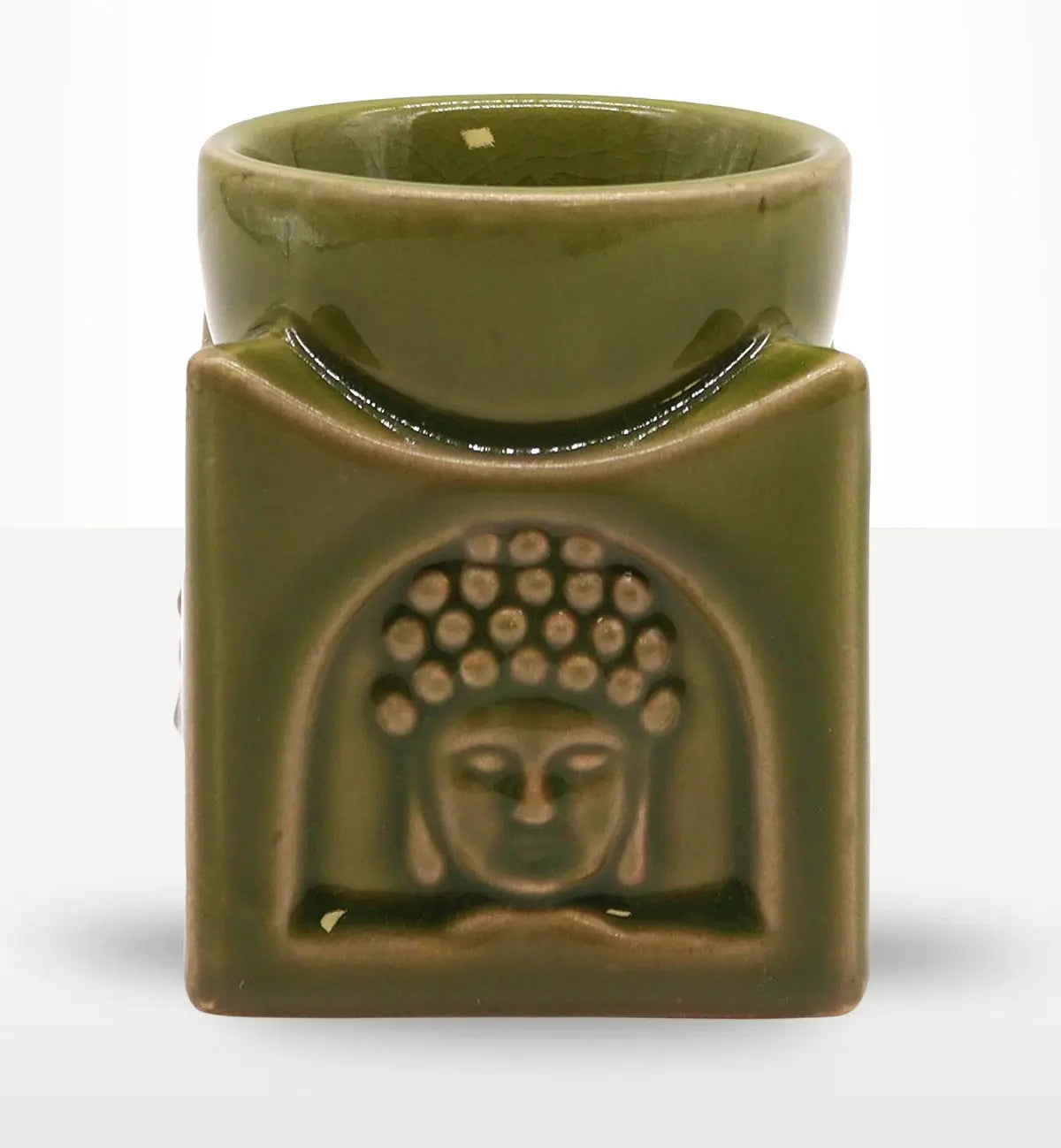 Square Buddha Burner - Light Jade featuring a smooth ceramic incense or oil burner with a carved Buddha face design in soft, calming green tones suitable for serene home decor.