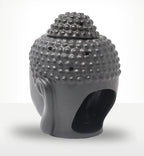 Buddah Head Oil Burner - Dark Brown in a smooth matte finish featuring textured curls and an opening at the back for placing a tealight candle, designed as a Buddha decor piece.