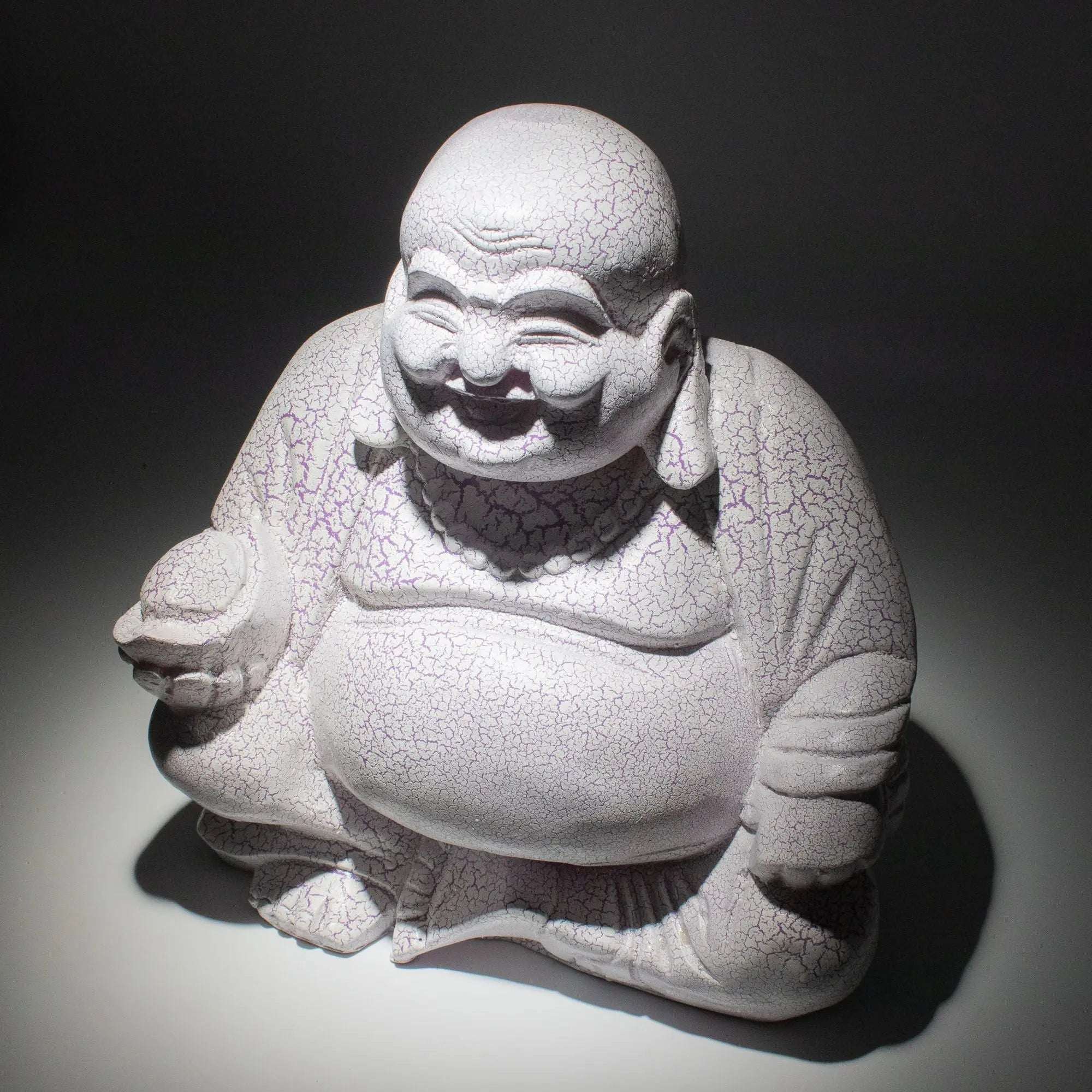 Laughing Buddha Lamp Lavender Crackle - Round Stand showcasing a hand-carved Buddha statue with a lavender crackle finish on a round stand, ideal for elegant Buddha decor.