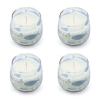 Set of four Small Glass Jar Candles - Seabreeze featuring white wax in transparent glass jars decorated with a blue fish pattern, evoking a fresh ocean theme.