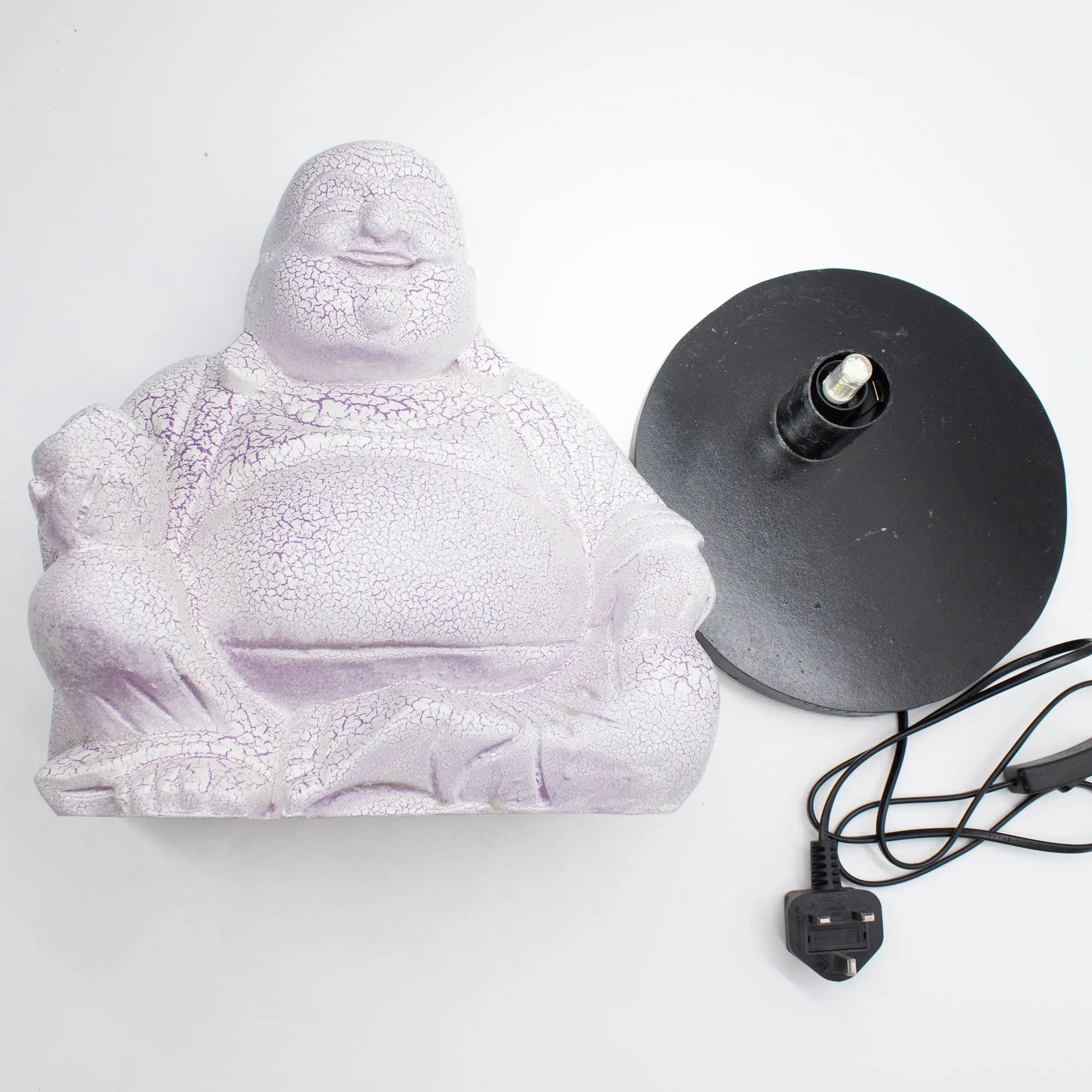 Laughing Buddha Lamp Lavender Crackle - Round Stand featuring a lavender crackle finish Buddha lamp with a separate black round base and power cord, ideal for Buddha decor and glow lamps.