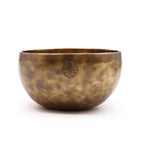 Large Nepalese Moon Bowl - (approx 850g) - 17cm with a smooth, hammered brass finish and a subtle circular emblem on the side, showcasing traditional craftsmanship.
