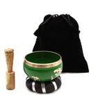 Tree of Life Singing Bowl Set- Green 10.7cm with wooden striker, cushioned base, and black velvet storage pouch, featuring intricate golden spiritual designs on the bowl.