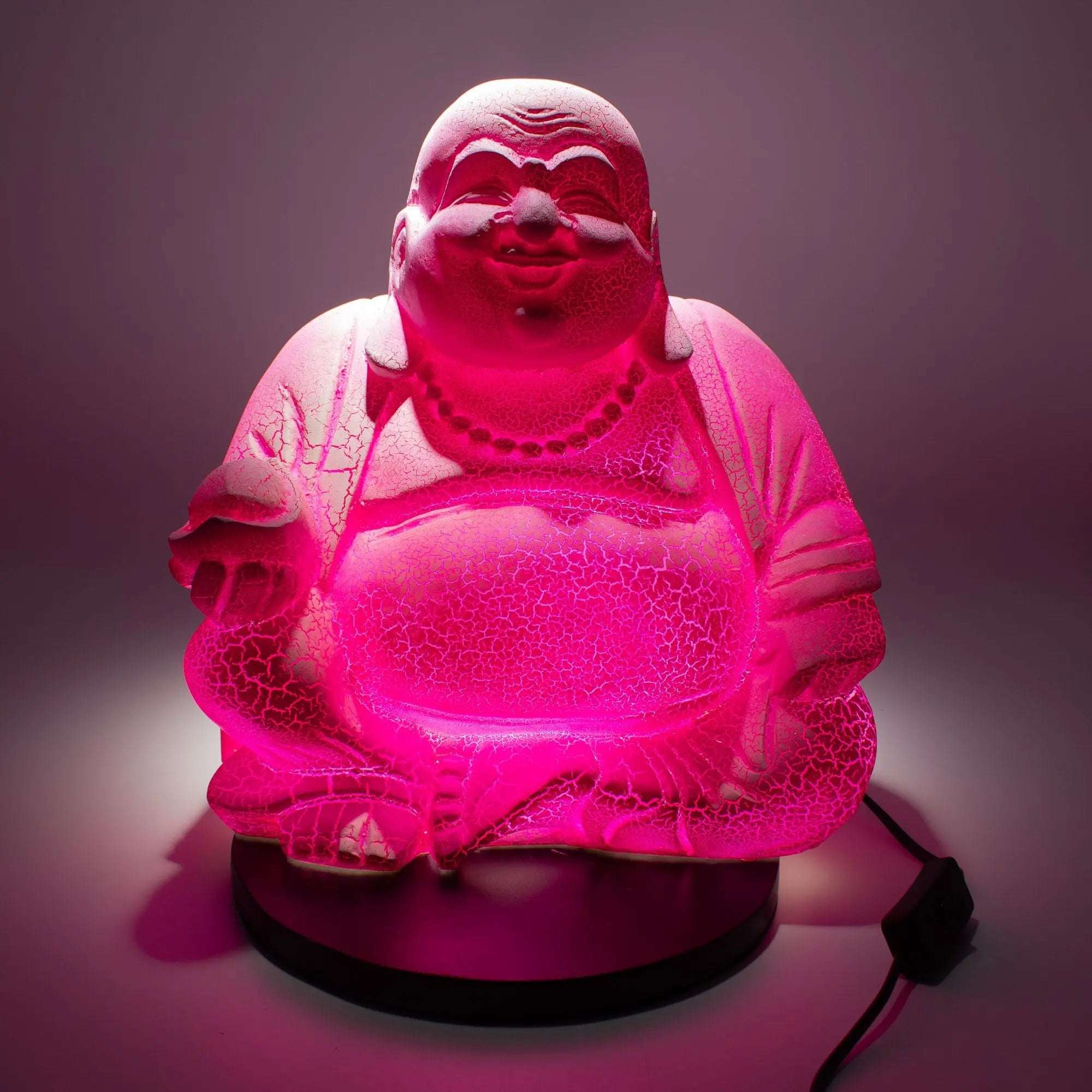 Illuminated Laughing Buddha Lamp Dragonfruit - Round Stand with textured, glowing pink resin surface sitting on a black circular base, featuring a serene smiling figure with beads.
