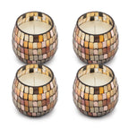 Four Small Glass Jar Candles - Amber Mosaic with warm-toned mosaic glass pieces in shades of amber, gold, and brown surrounding white wax candles inside.