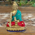 Brass Buddha Figure - Hands Down - 11.5 cm featuring vibrant red and turquoise mosaic inlay, seated on an ornate base with a peaceful expression and detailed craftsmanship.