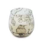Small Glass Jar Candles - Drawn by Flame featuring a delicate design of a hummingbird and botanical illustrations on frosted glass for an elegant, nature-inspired look.