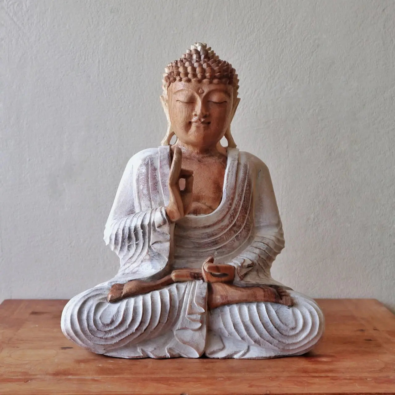 Buddha Statue Whitewash - 30cm Teaching Transmission depicting a serene meditating figure with detailed carving and a whitewashed finish, ideal for peaceful home décor.