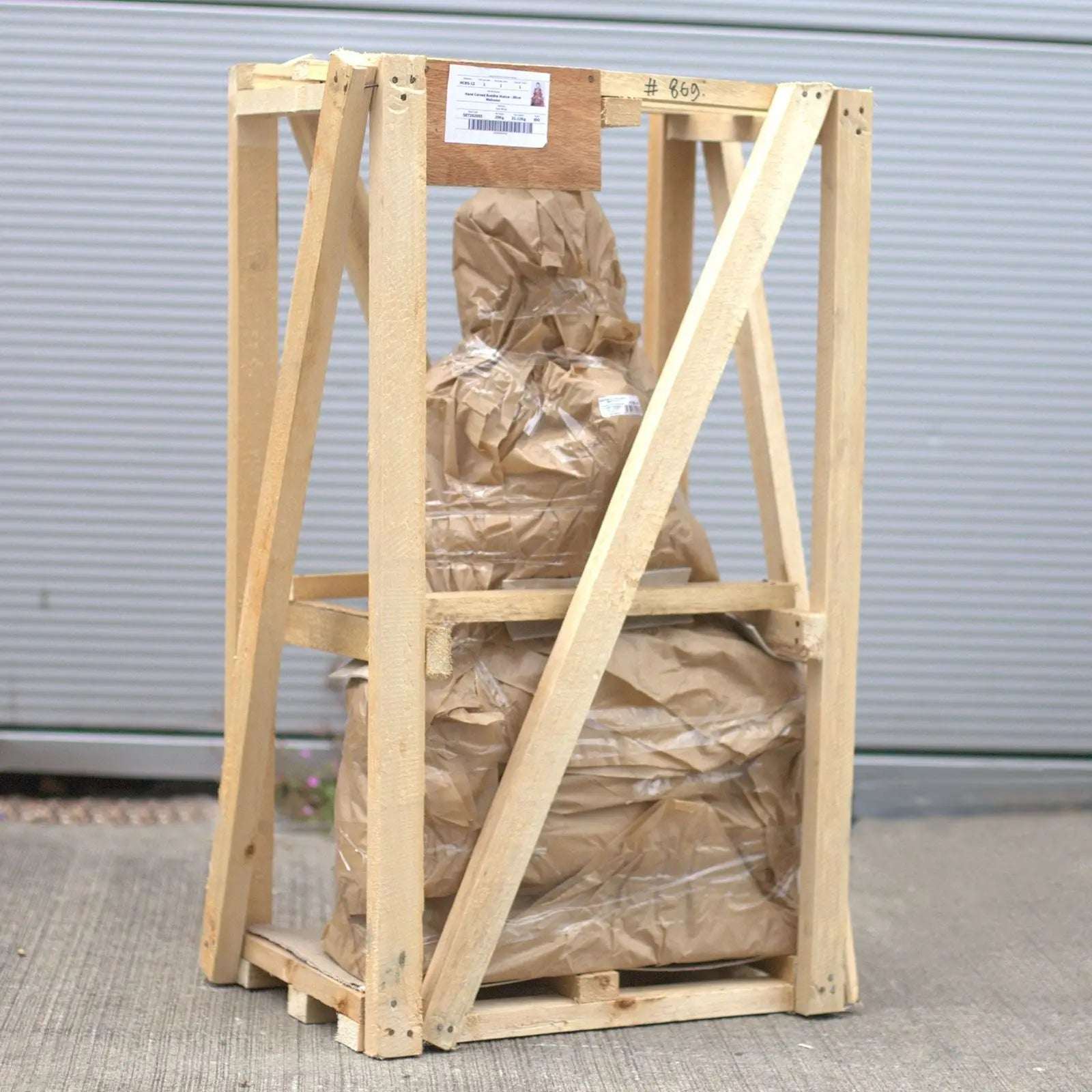 Hand Carved Buddha Statue - 40cm Welcome wrapped in protective brown paper and secured within a wooden crate, ready for safe shipping and handling.