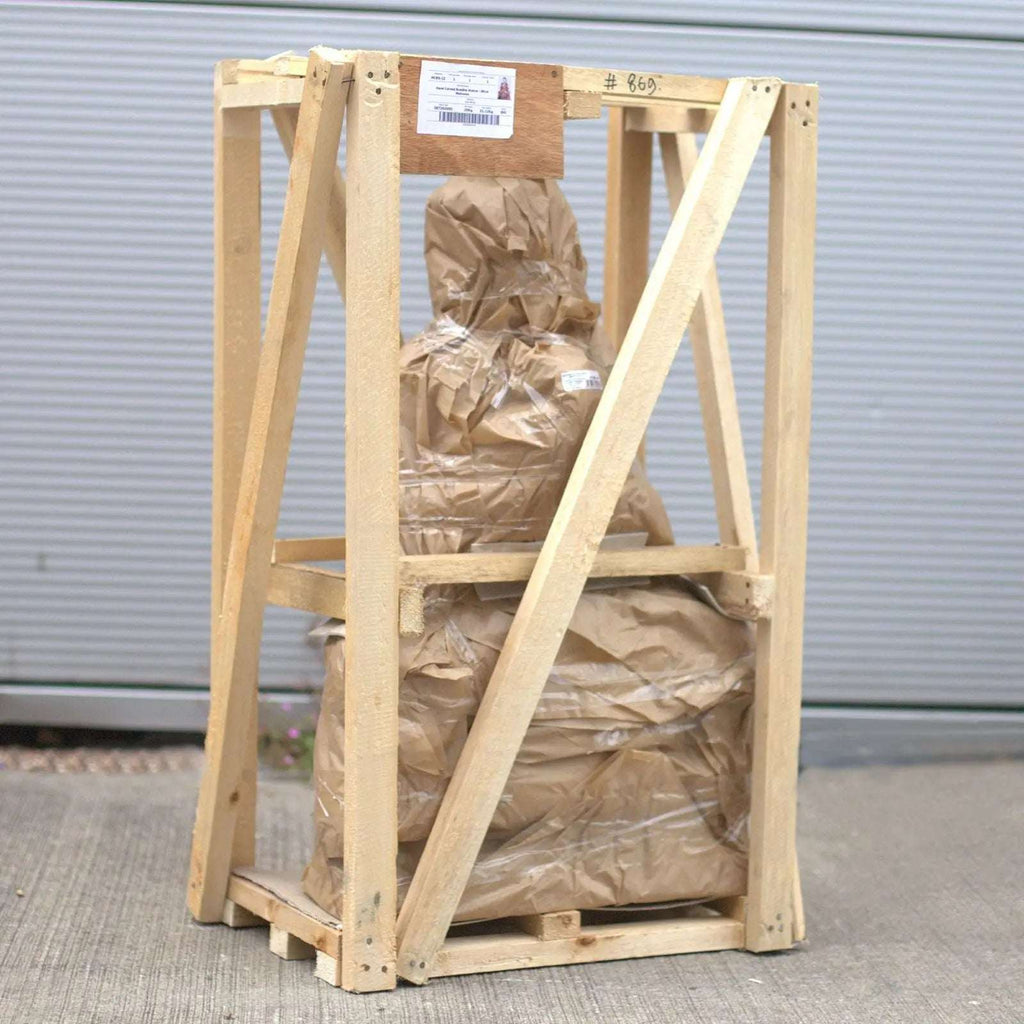 Hand Carved Buddha Statue - 40cm Teaching Transmission wrapped in protective brown paper and secured within a wooden crate for safe transport and delivery.