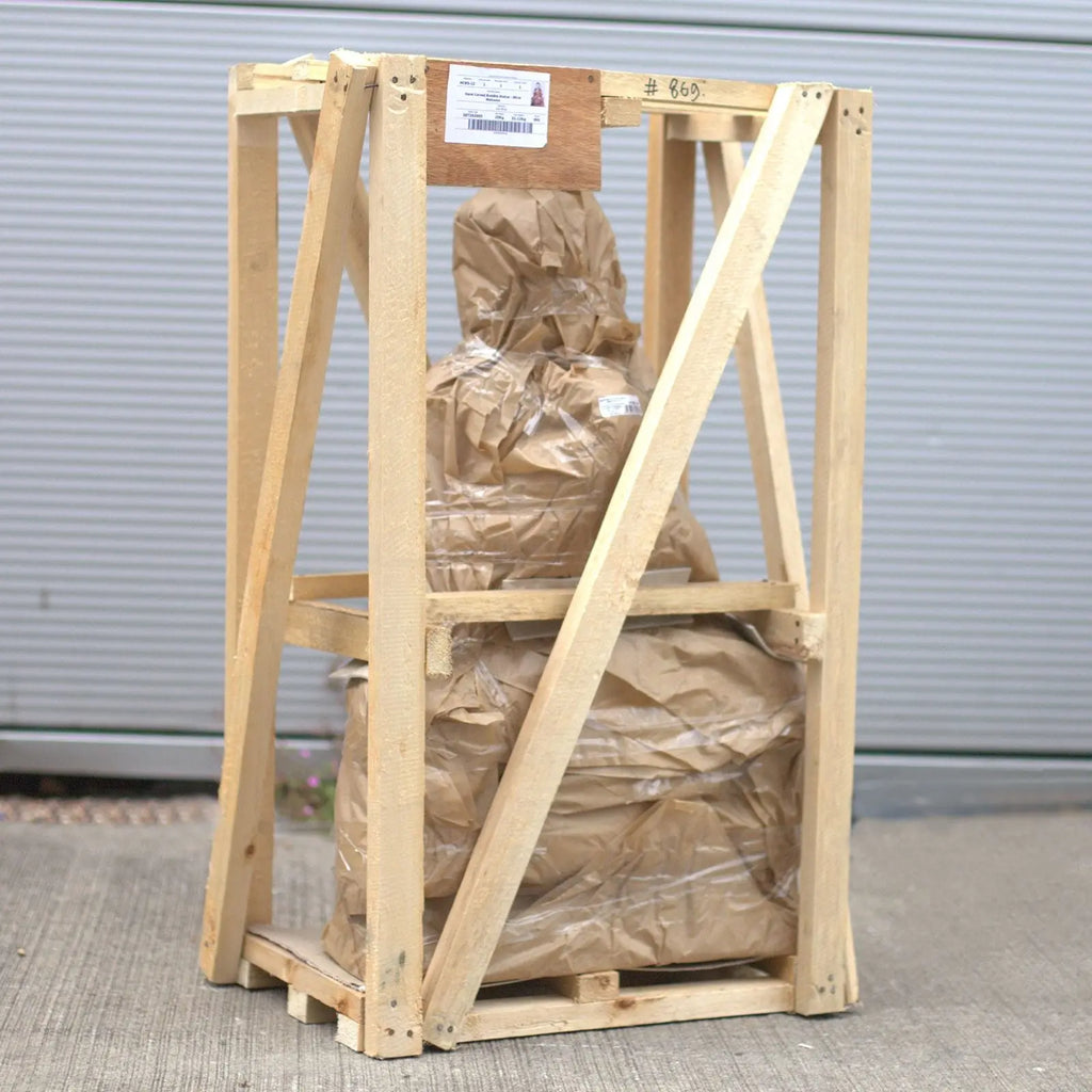 Hand Carved Buddha Statue - 40cm Hand Down wrapped in protective brown paper and secured within a wooden crate for safe transport or storage.
