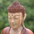 Hand Carved Buddha Statue - 40cm Welcome featuring detailed wood craftsmanship with serene facial expression and textured hair, ideal for peaceful decor settings.