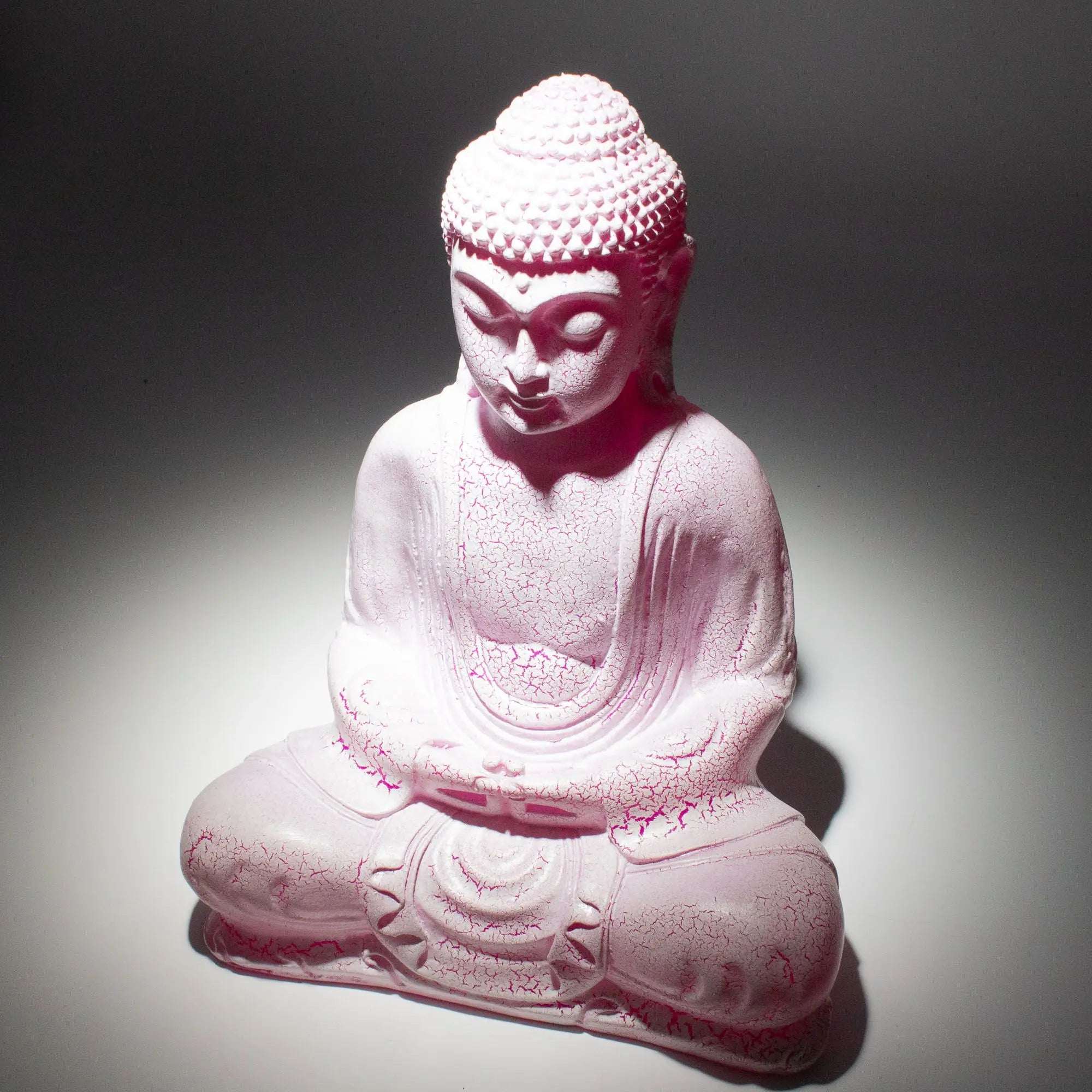 Meditation Buddha Lamp Cherry Crackle - Oval Stand in soft pink with crackled texture, featuring a serene seated Buddha figure emitting a gentle glow.