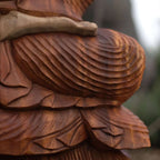 Hand Carved Buddha Statue - 40cm Teaching Transmission showing detailed craftsmanship of wood texture and intricate carving on the statue's robe and hand.
