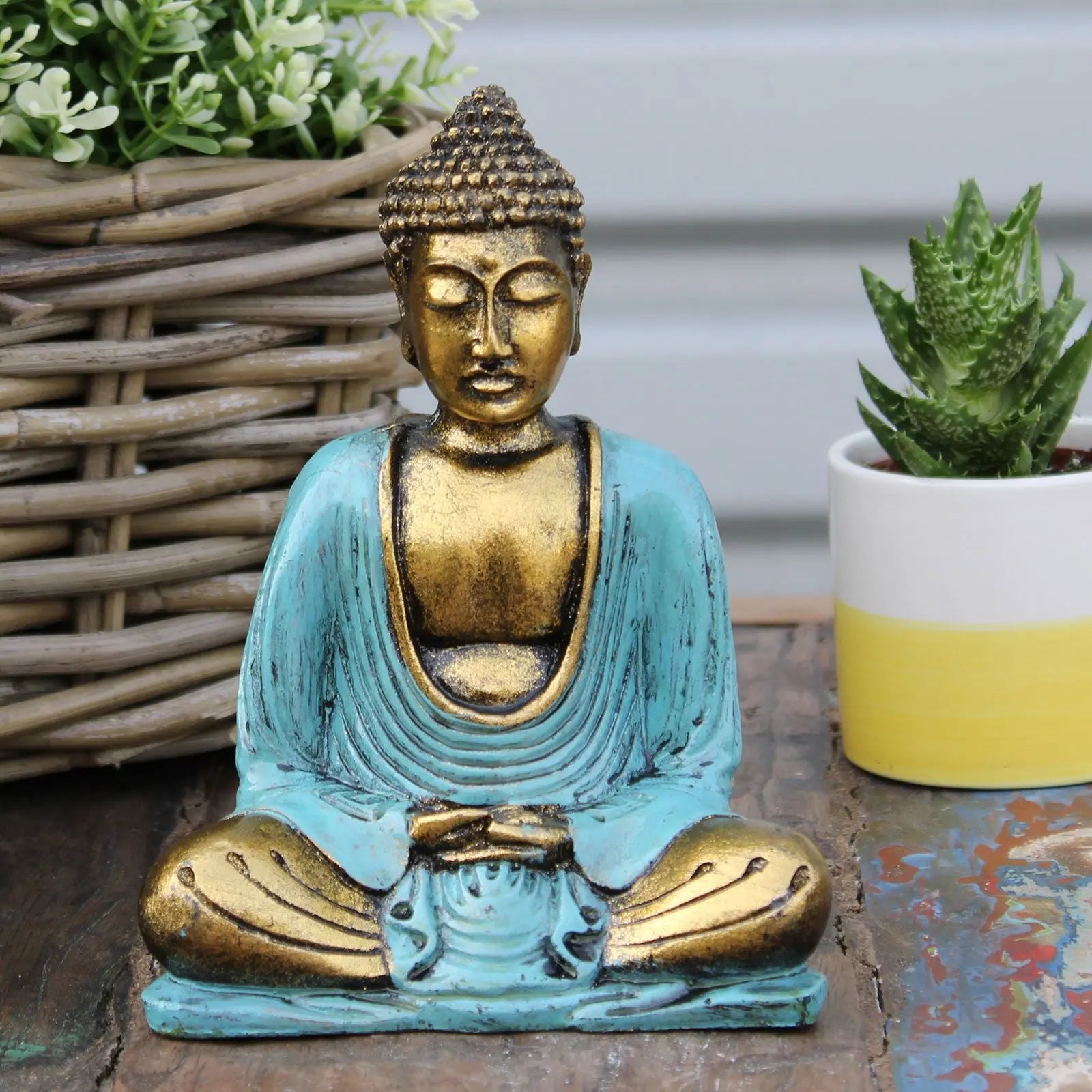 Teal & Gold Buddha - Medium, a serene resin Buddha statue with a calming gold finish and vibrant teal robe, perfect for peaceful tabletop or home decor.