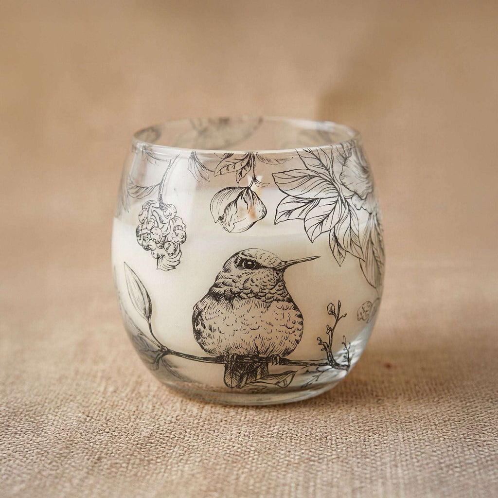 Small Glass Jar Candles - Drawn by Flame featuring a delicate bird and floral design etched on frosted glass, creating a warm and artistic ambiance.