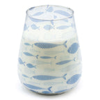 Tall Glass Jar Candles - Seabreeze features a white candle in a glass jar decorated with a pattern of light blue fish, evoking a calm and refreshing coastal vibe.