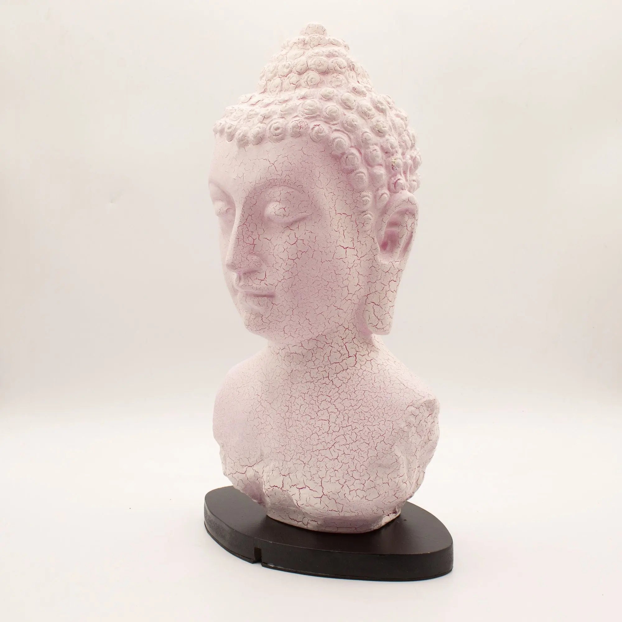 Buddha Bust Lamp Cherry Crackle - Oval stand featuring a pink crackled finish on a serene Buddha head sculpture mounted on a black oval base, ideal for calming Buddha decor.