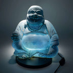 Laughing Buddha Lamp Sky Blue - Round Stand glowing softly with a serene sky blue light, featuring detailed hand-carved resin Buddha statue on a round black base.