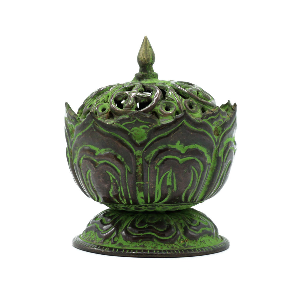 Original studio view of the small brass verdigris Tibetan lotus incense burner with its lid in place.