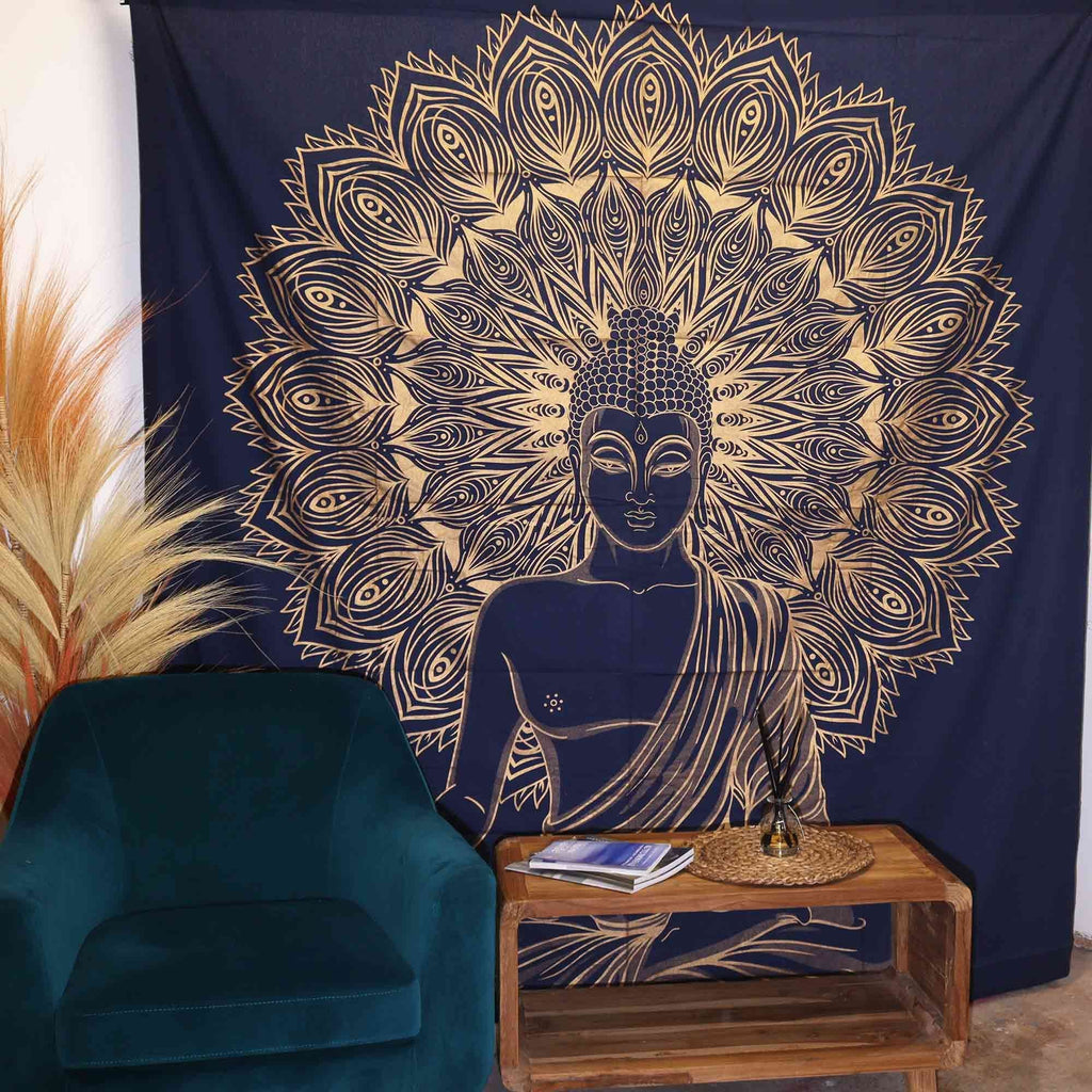Double Cotton Bedspread + Wall Hanging - Buddha - Blue Gold featuring an intricate gold Buddha design on deep blue fabric, styled with a teal chair and wooden side table for serene Buddha decor.