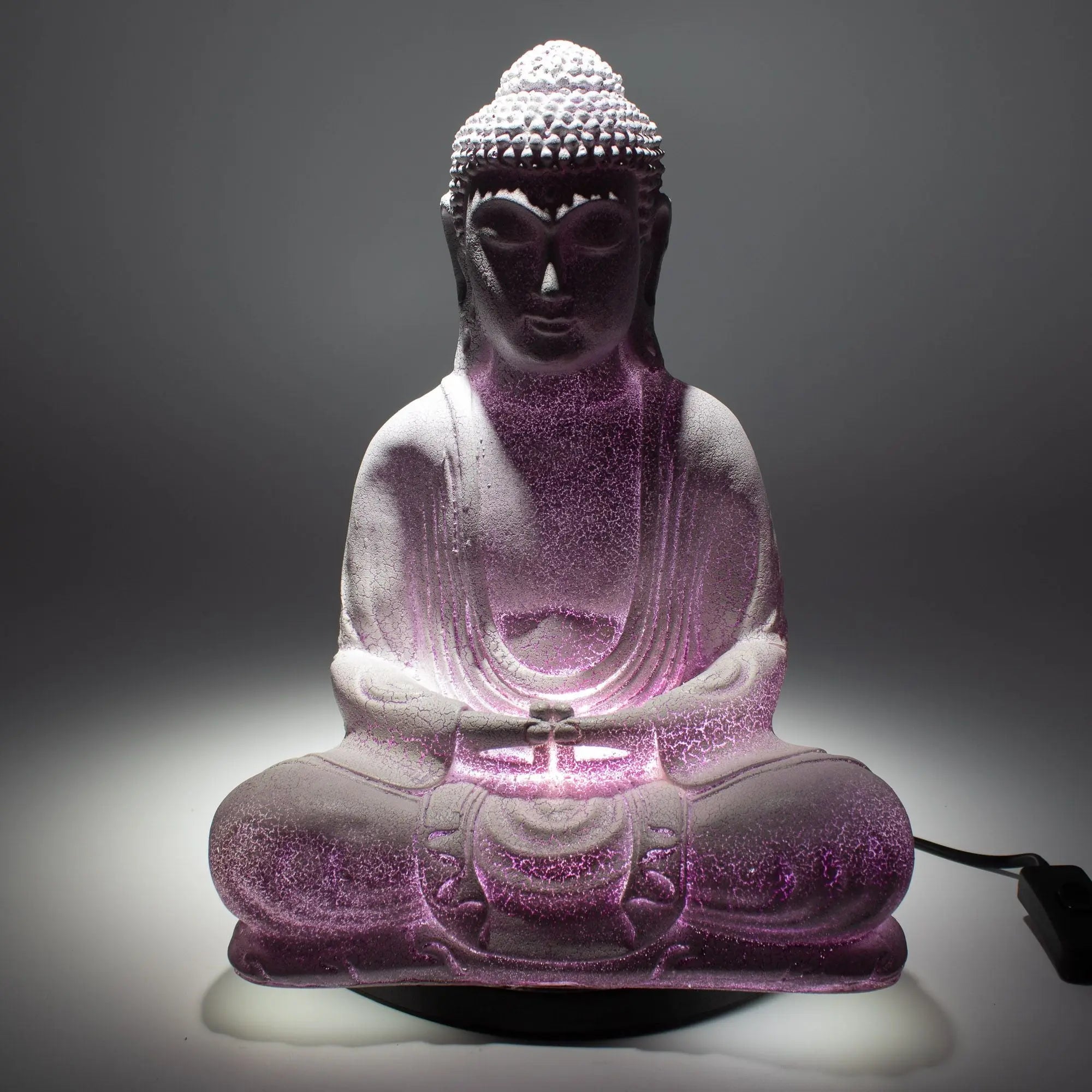 Meditation Buddha Lamp Lavender Crackle - Oval Stand glowing softly with a calming lavender crackle finish, designed as a serene Buddha statue for peaceful home decor.