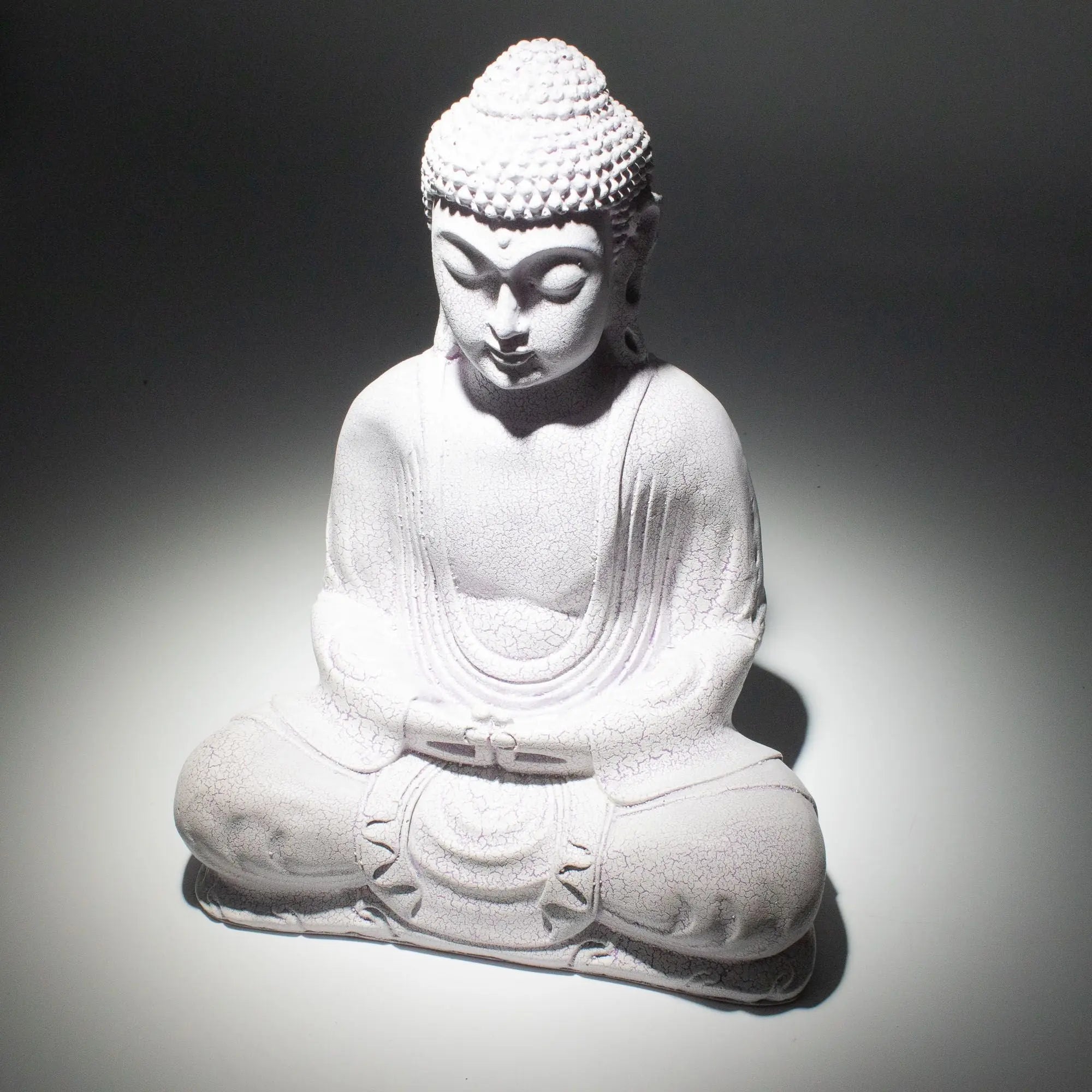 Meditation Buddha Lamp Lavender Crackle - Oval Stand featuring a serene Buddha statue with a textured lavender crackle finish, glowing softly on an oval base for calming Buddha decor.