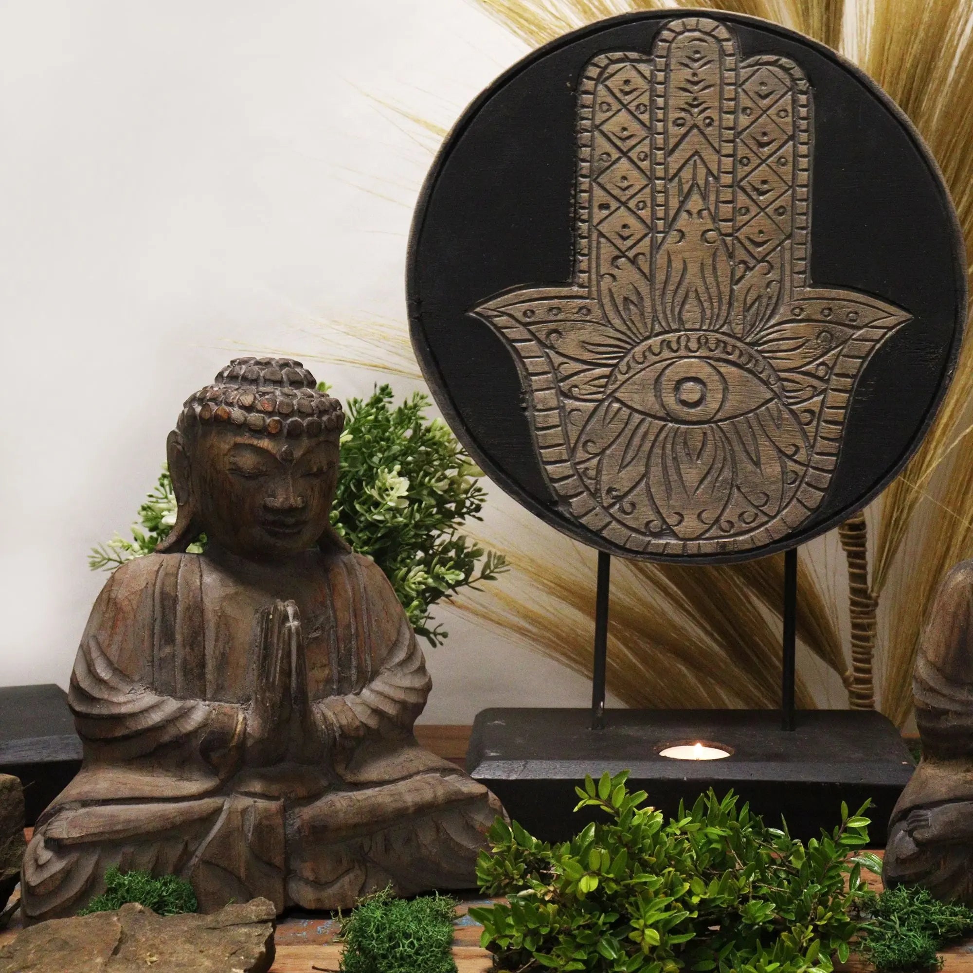 Decorative Buddha Feng Shui Set - Hamsa - Grey featuring a hand-carved Buddha statue in meditation pose with a detailed grey Hamsa symbol backdrop, perfect for peaceful home decor.