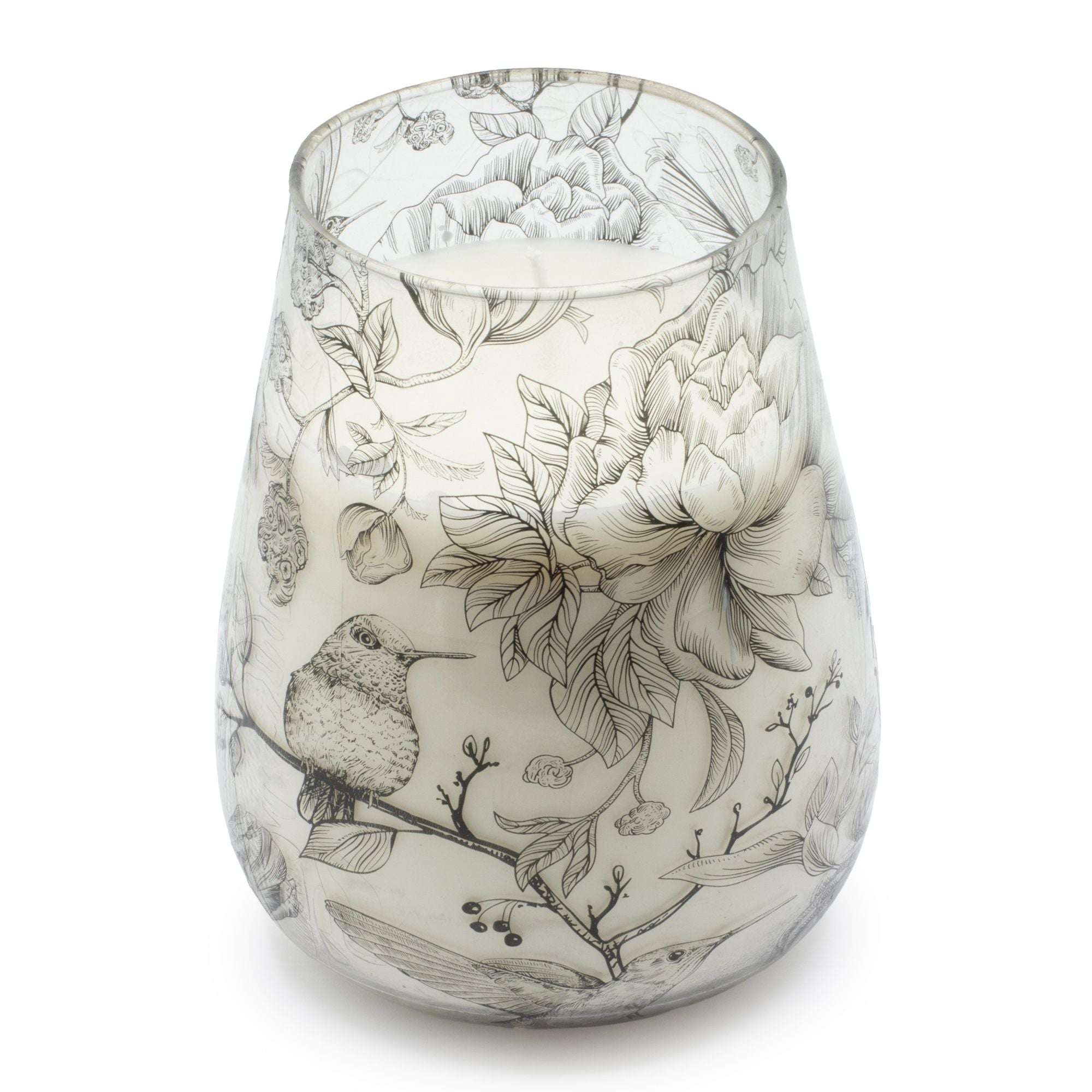 Tall Glass Jar Candles - Drawn by Flame featuring a delicate black and white botanical and hummingbird design on a tapered glass jar with a white candle inside.