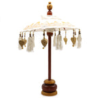 Bali Home Decor Parasol - Canvas - Gold Decor- 40cm with intricate gold patterns on white canvas, wooden stand, hanging tassels, and decorative gold charms for elegant home accents.