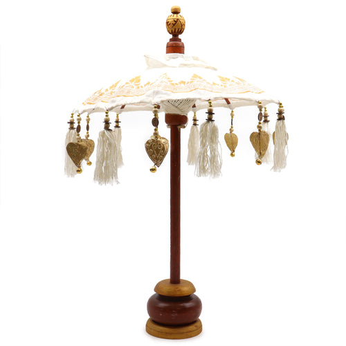 Bali Home Decor Parasol - Canvas - Gold Decor- 40cm with intricate gold patterns on white canvas, wooden stand, hanging tassels, and decorative gold charms for elegant home accents.