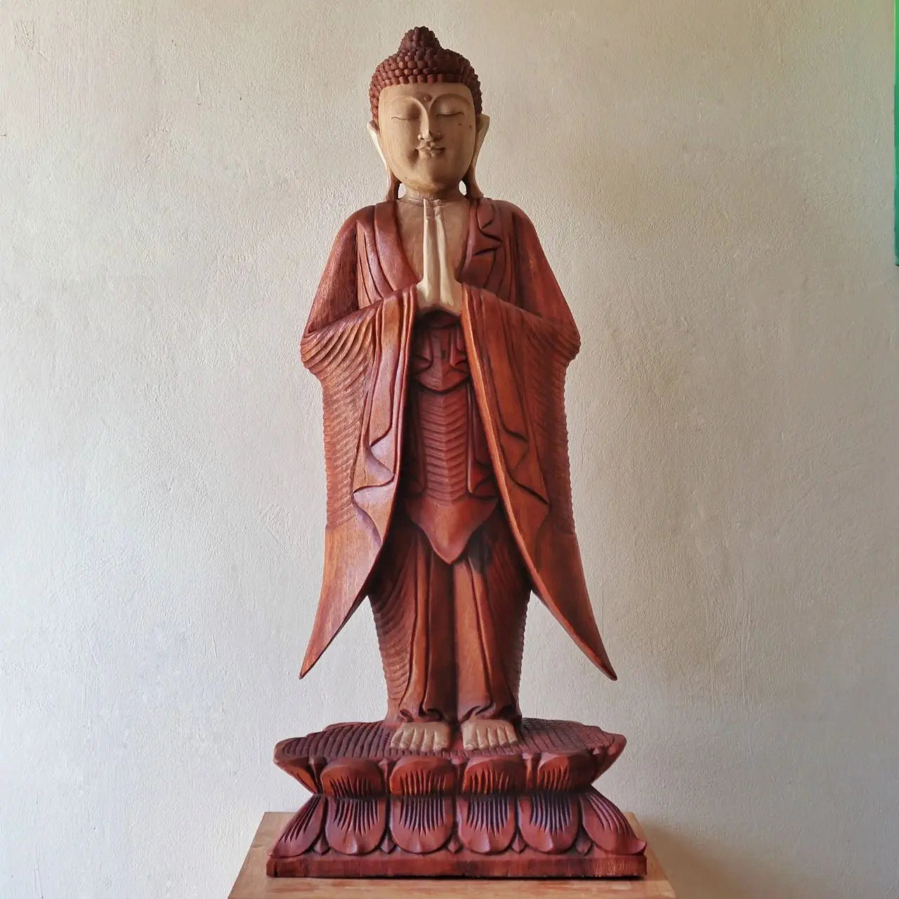 Buddha Statue Standing - 1m Welcome featuring a hand-carved wooden finish with intricate draped robes and a serene expression, perfect for peaceful Buddha decor.