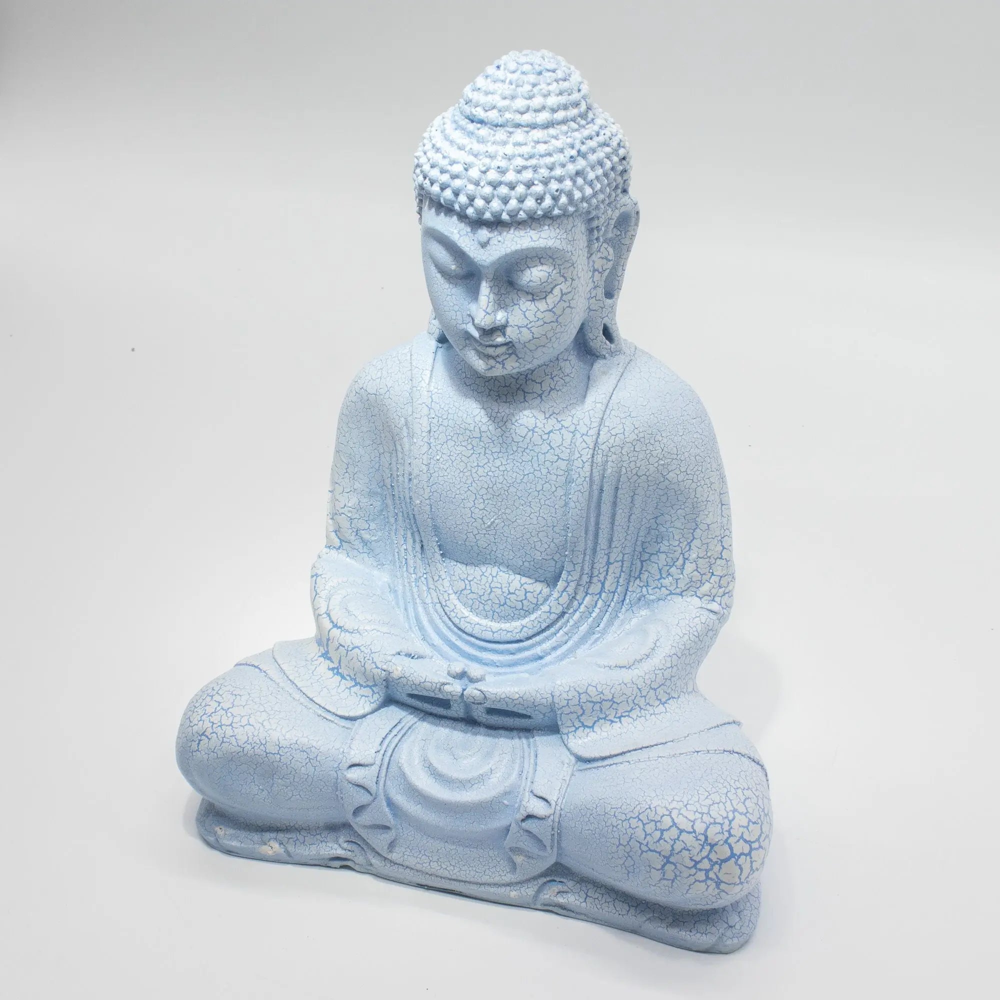 Meditation Buddha Lamp Sky Blue - Oval Stand, featuring a serene hand-carved Buddha figure in a soft sky blue with a textured finish, ideal for tranquil home decor.