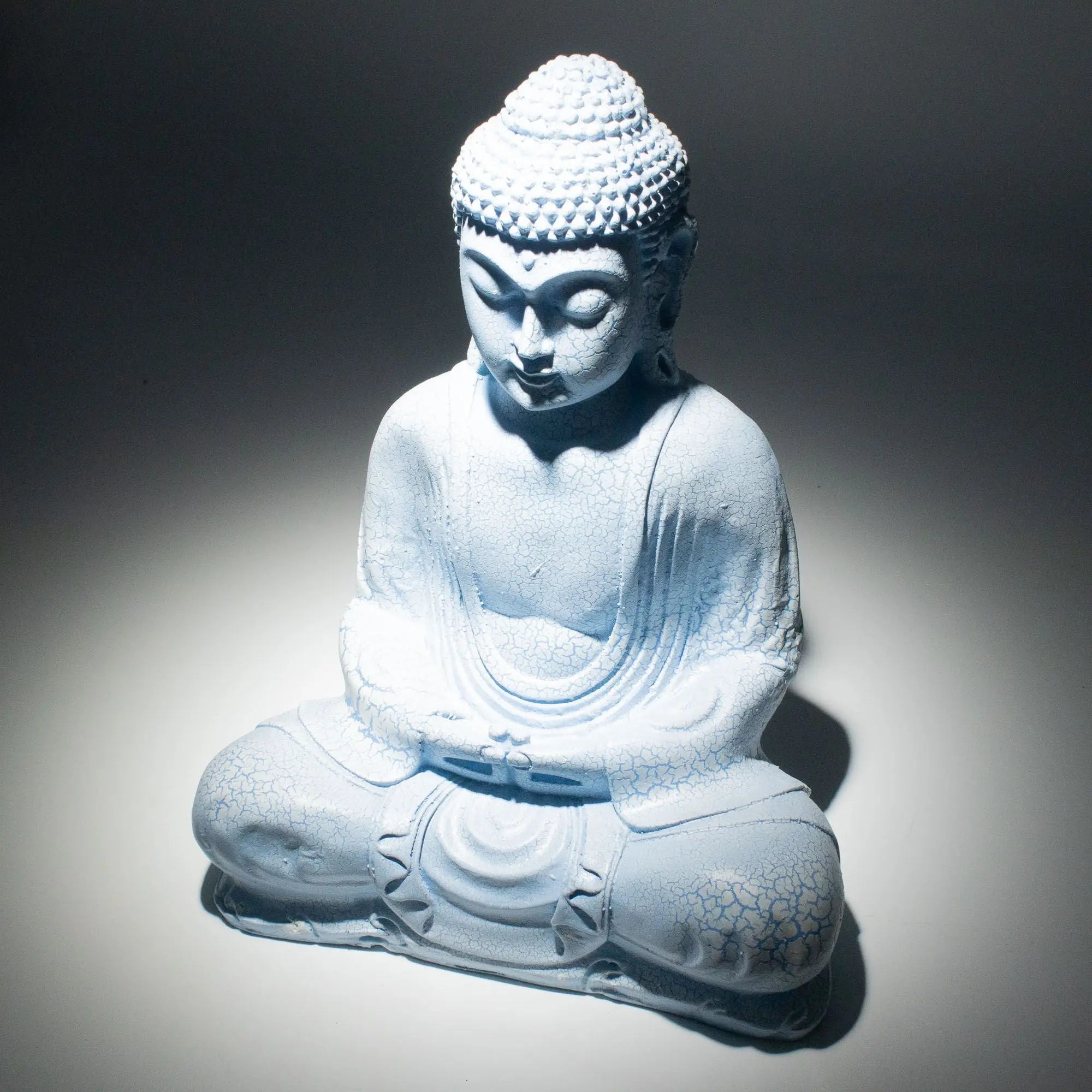 Meditation Buddha Lamp Sky Blue - Oval Stand featuring a serene hand-carved Buddha statue illuminated with soft blue light, ideal for peaceful Buddha decor and glow lamp settings.